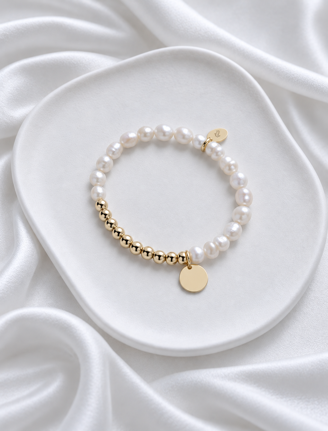 Perlenarmband gold